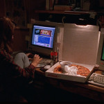 Angela eats pizza and cyberchats about her life in The Net