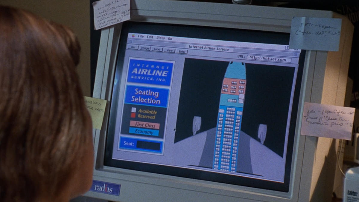 The Net (1995) is a really fun dial-up internet thriller
